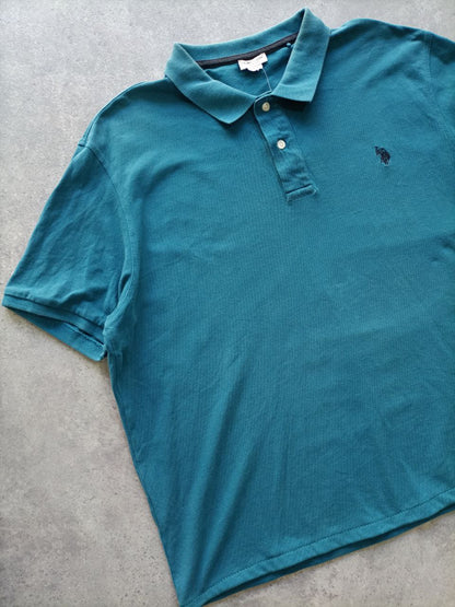 Polo Vintage Croppata Uomo – Petrolio U.S. Polo Assn. (Taglia XL IT / Etichetta 3XL)